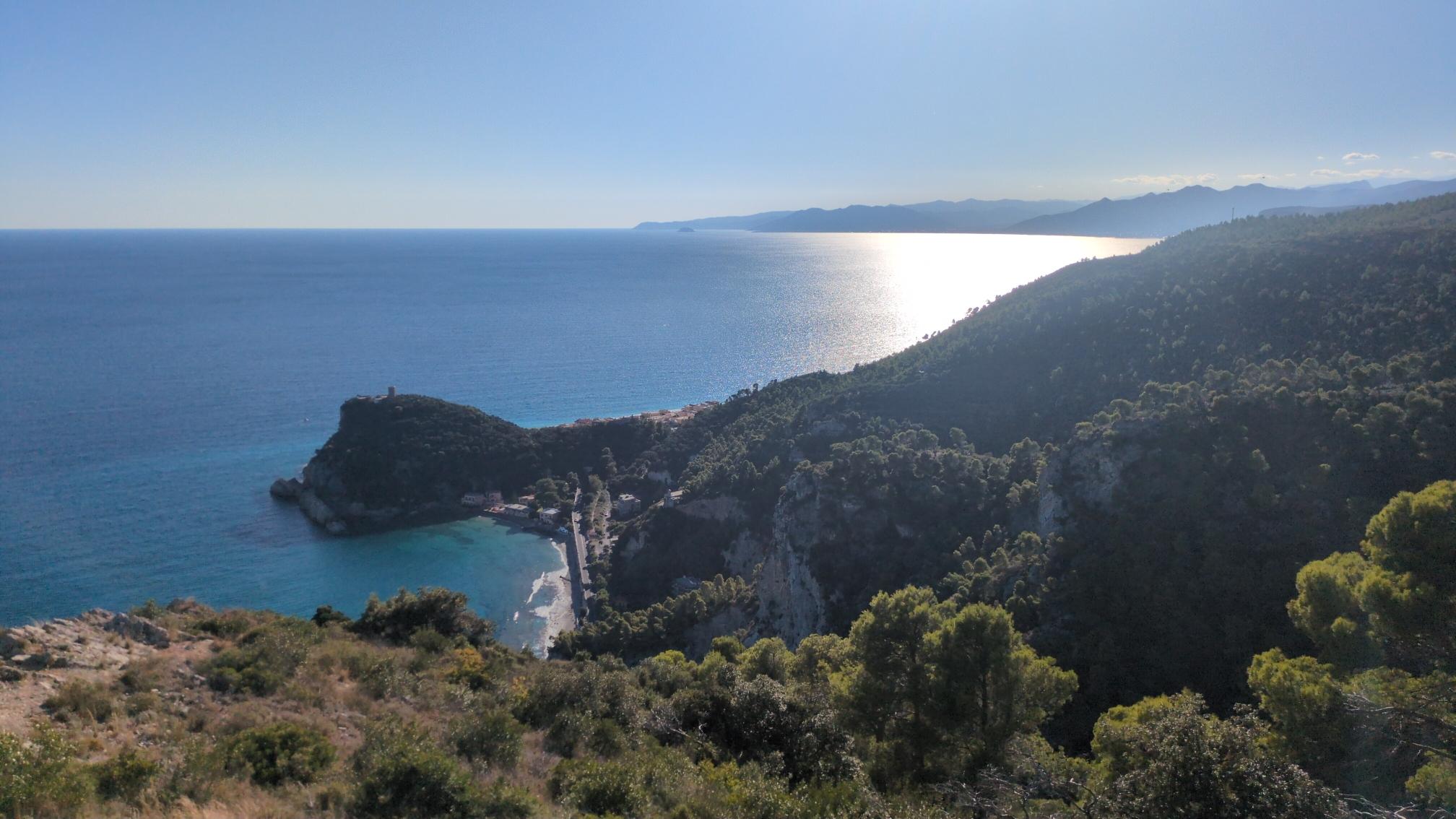 View westwards of the coastline. The tower on the hill in the sea is from the medieval era.
